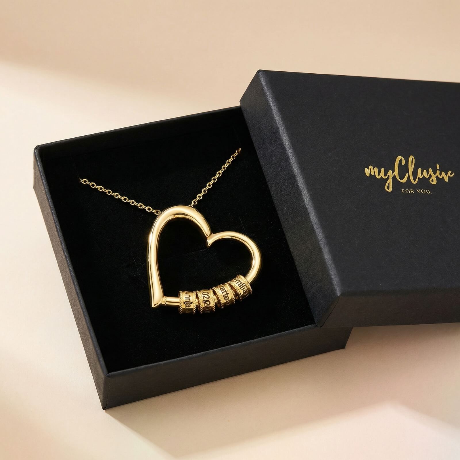 Hartketting met gegraveerde kralen