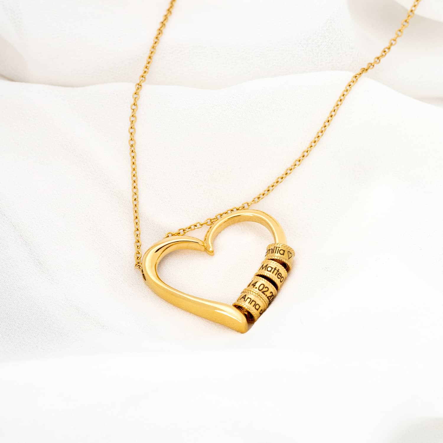 Collana a cuore con perle incise